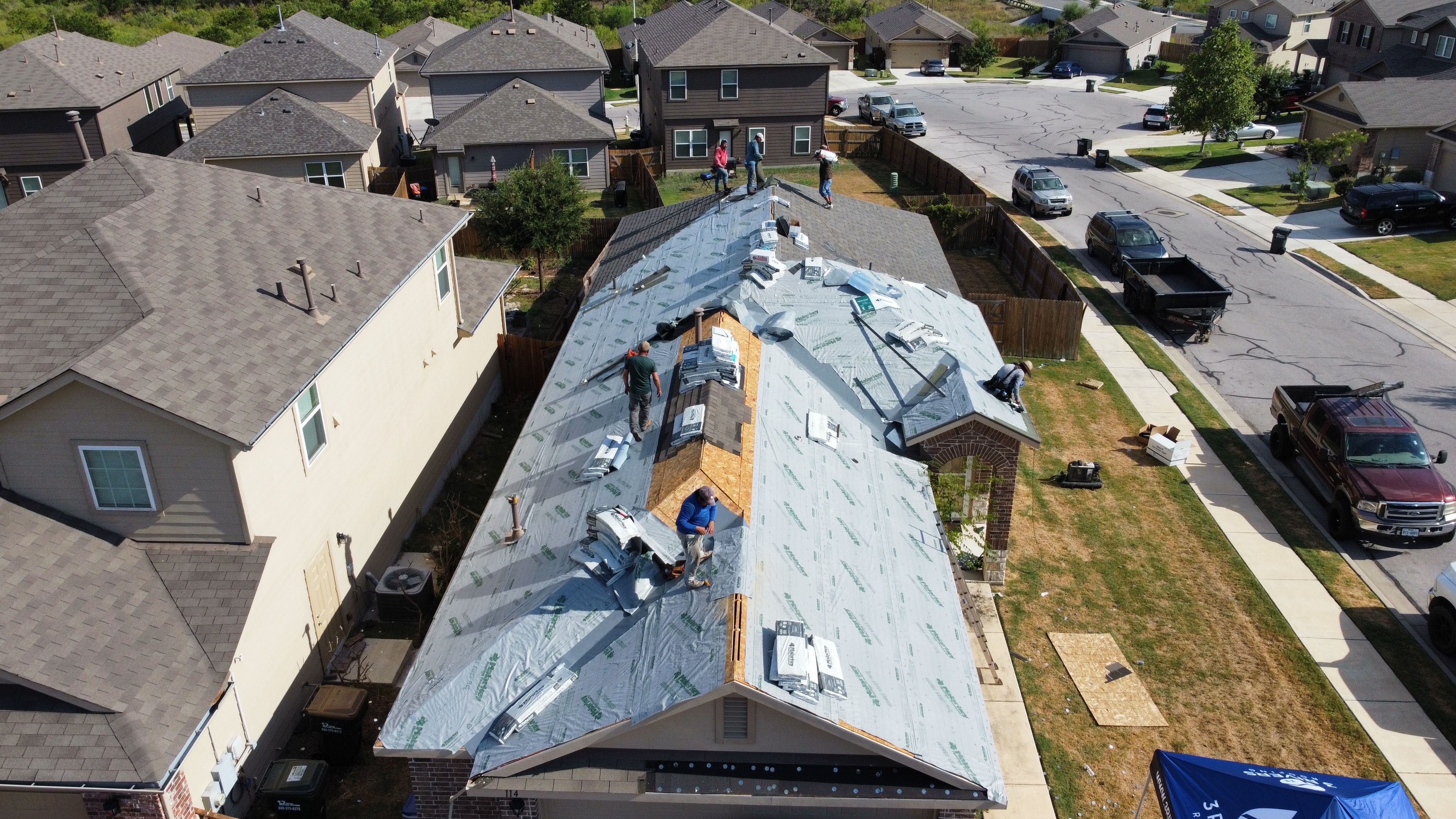 3 Rivers Roofing crew installing underlayment