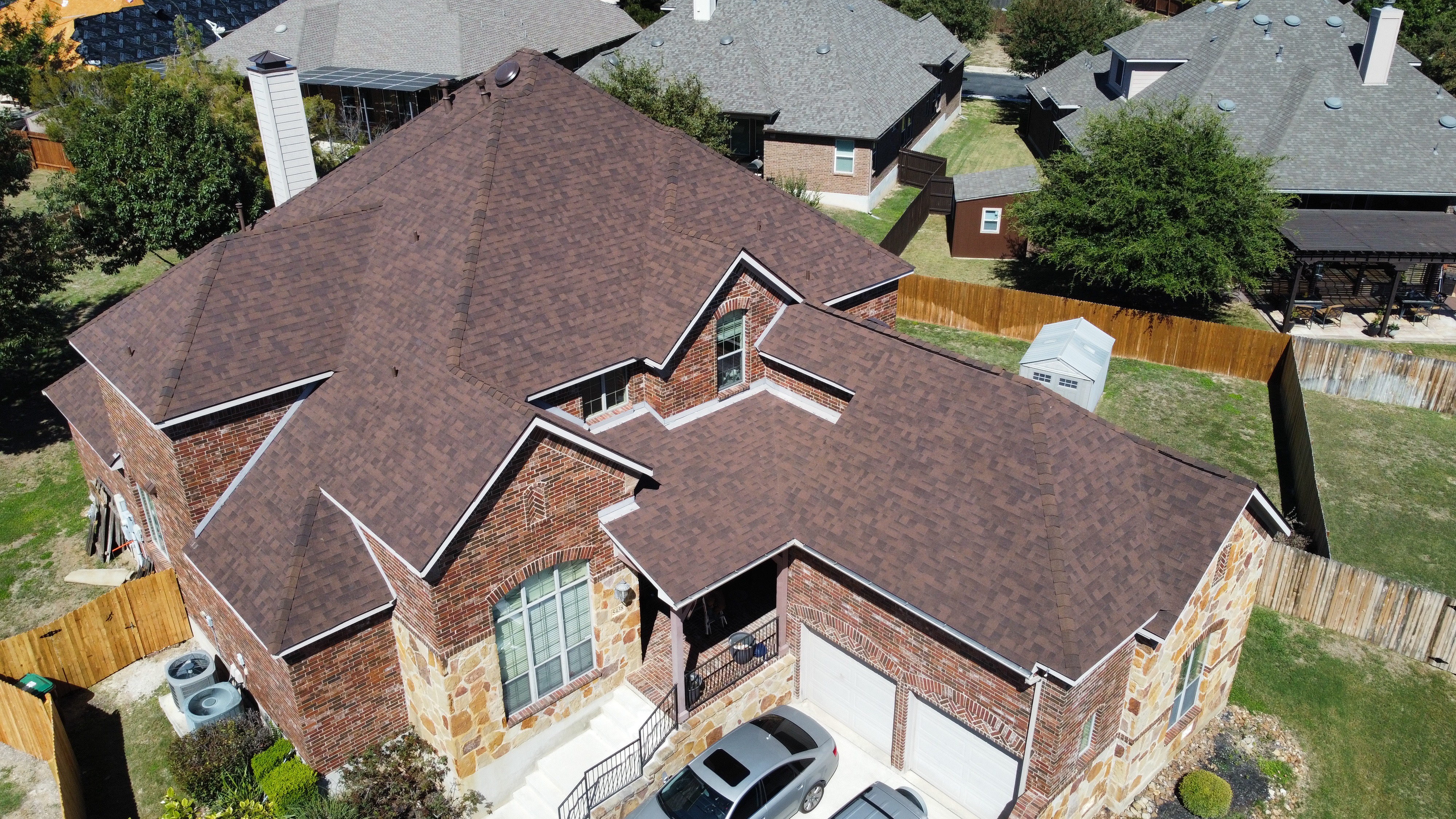 Aerial view of completed roofing project